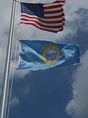 American flag and South Dakota flag