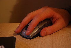 hand holding computer mouse