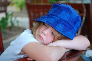 blue hat sleeping