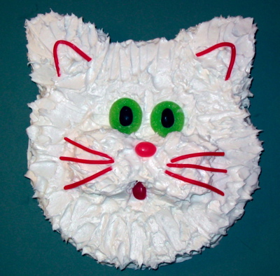 Cat On Cake