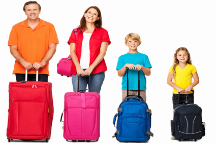 Smiling Family With Their Luggage - Isolated